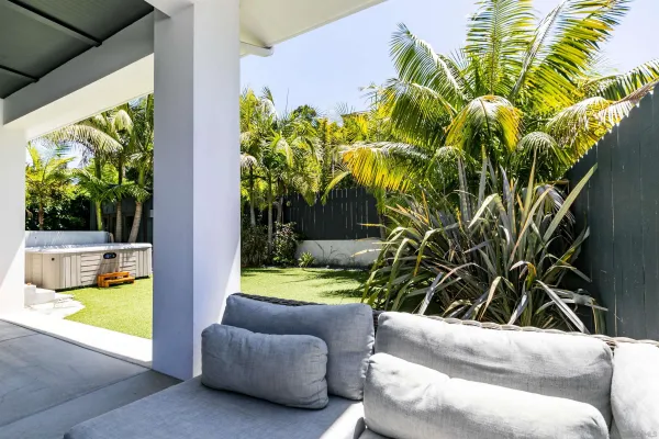 a view of a swimming pool with a yard