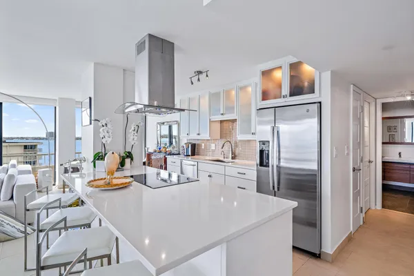 a view of a livingroom with furniture and a table