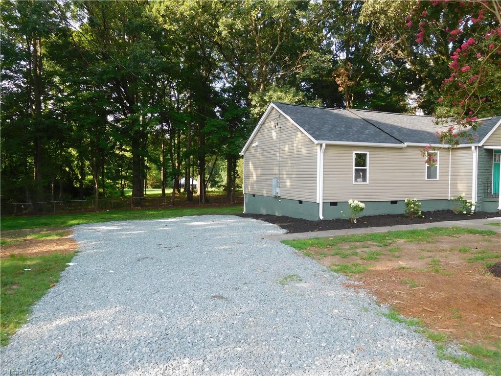 1324 Motor Road Winston-Salem, NC 27105 - Photo 23 of 27 Front View. Freshly poured gravel for driveway. Plenty of parking at this home.
