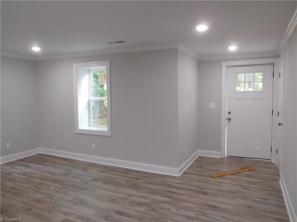 1324 Motor Road Winston-Salem, NC 27105 - Photo 3 of 27 Inviting Covered Front porch as well as side covered porch. ALL NEW: SIDING, WINDOWS, ROOF & HVAC.