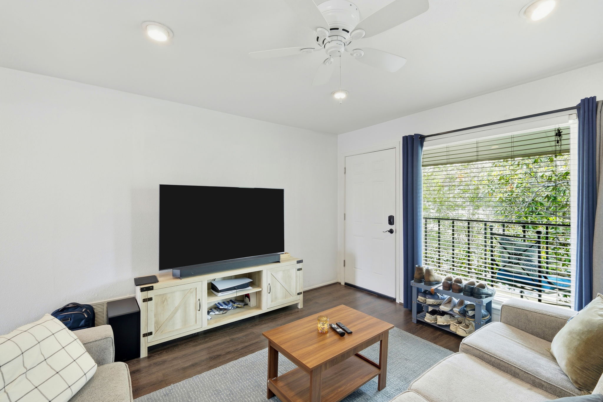 6910 Hart Lane, Unit 912 Austin, TX 78731 - Photo 5 of 36 Living area featuring wood-finish flooring, recessed lighting, and a ceiling fan