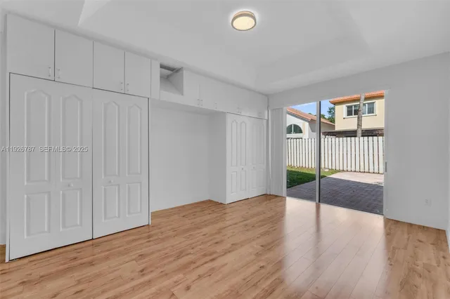 a utility room with sink dryer and washer