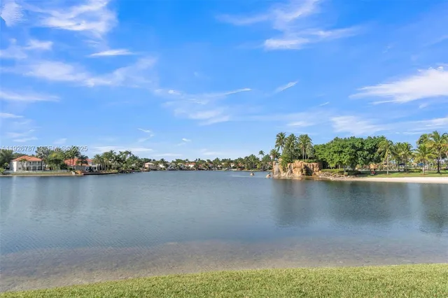 a view of a lake with a city