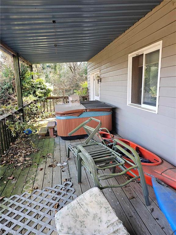 420 Beau Rivage Drive Crumpler, NC 28617 - Photo 23 of 29 lower deck with hot tub