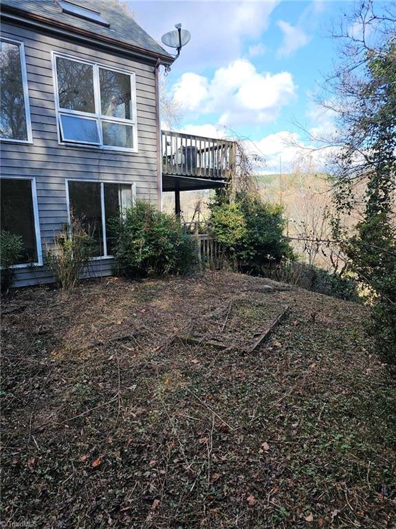 420 Beau Rivage Drive Crumpler, NC 28617 - Photo 25 of 29 side yard