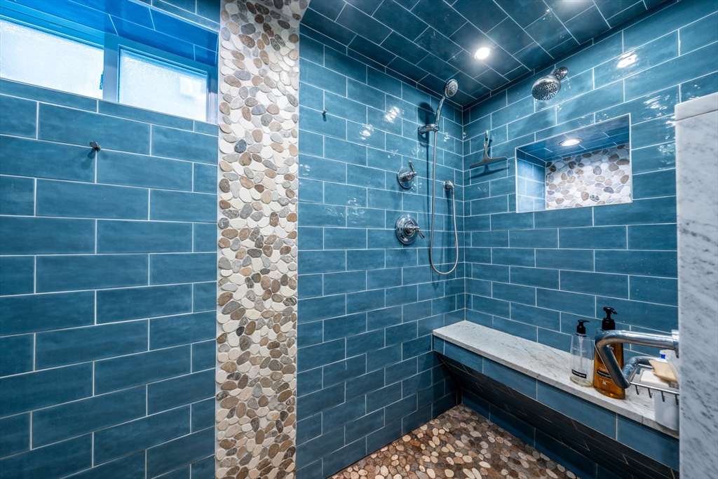 215 Roxy Cahoon Road Plymouth, MA 02360 - Photo 29 of 40 a bathroom with a sink and a shower