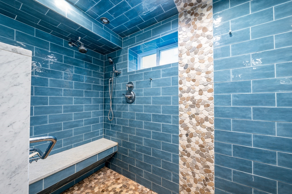 215 Roxy Cahoon Road Plymouth, MA 02360 - Photo 30 of 40 a bathroom with a sink and shower