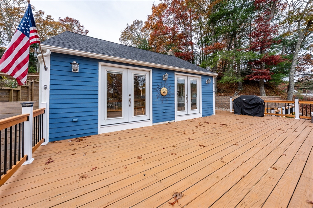 215 Roxy Cahoon Road Plymouth, MA 02360 - Photo 3 of 40 a view of a house with a wooden deck