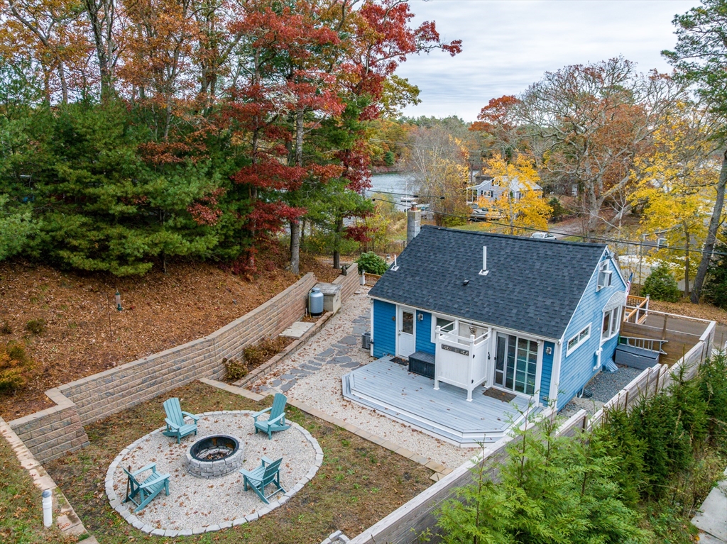 215 Roxy Cahoon Road Plymouth, MA 02360 - Photo 40 of 40 an aerial view of a house with swimming pool and large trees