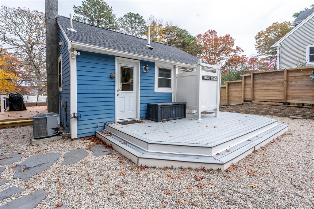 215 Roxy Cahoon Road Plymouth, MA 02360 - Photo 5 of 40 a view of a house with backyard