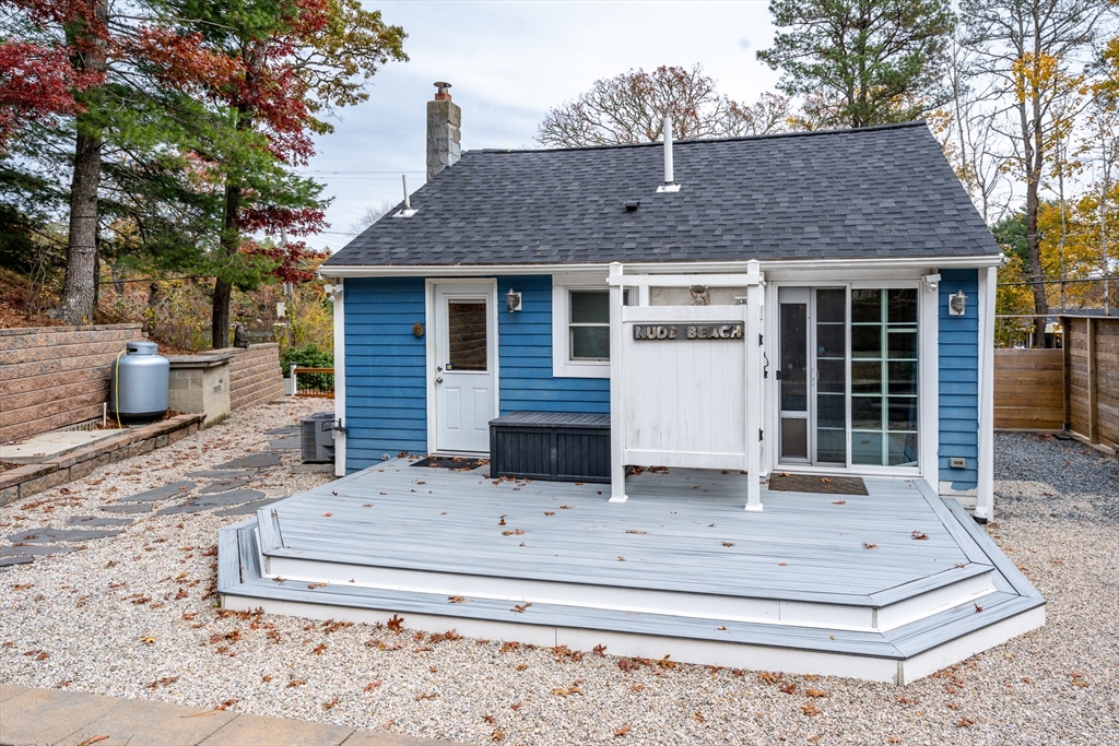 215 Roxy Cahoon Road Plymouth, MA 02360 - Photo 6 of 40 a front view of a house with entertaining space