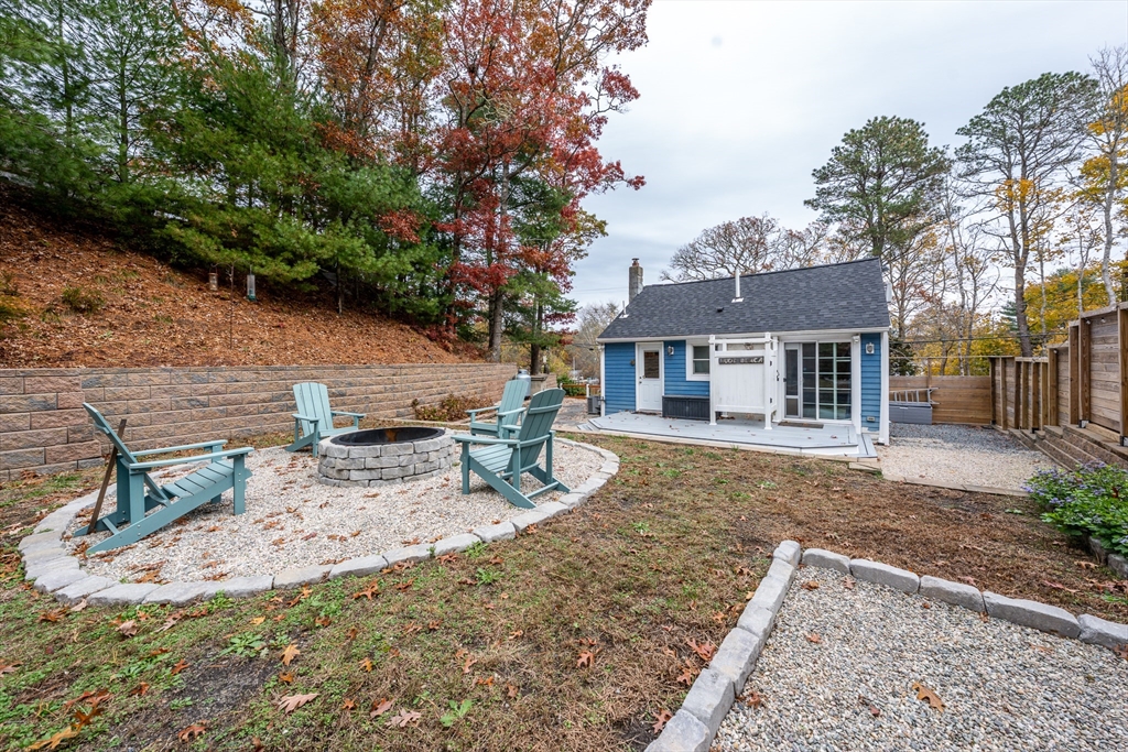 215 Roxy Cahoon Road Plymouth, MA 02360 - Photo 7 of 40 a view of a house with backyard