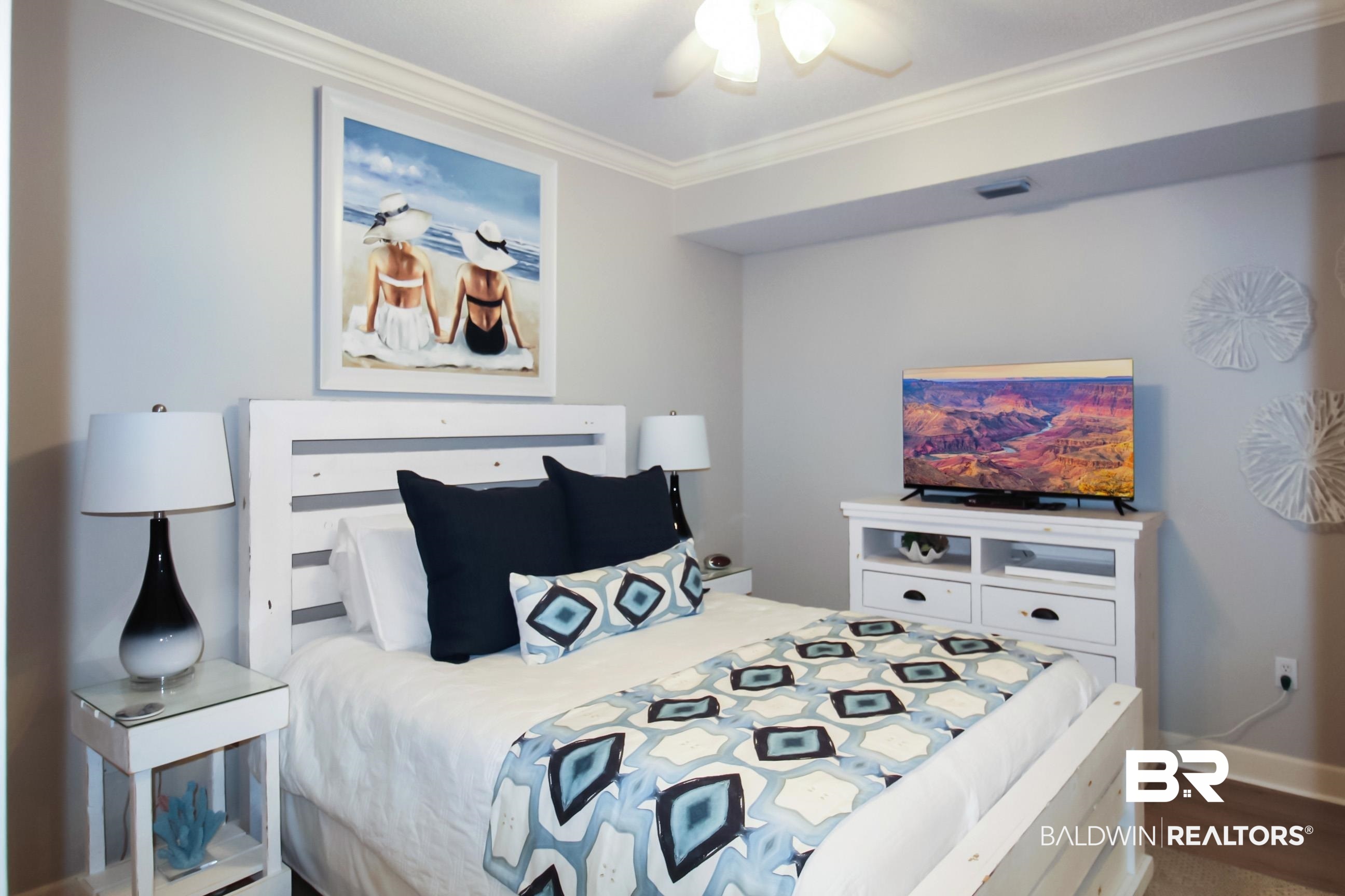 27580 Canal Road, Unit 1425 Orange Beach, AL 36561 - Photo 16 of 28 Bedroom with crown molding, wood finished floors, and ceiling fan