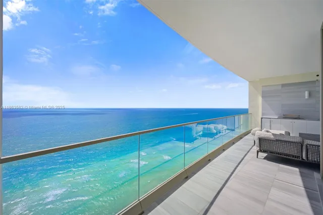 a view of an entryway with a mirror