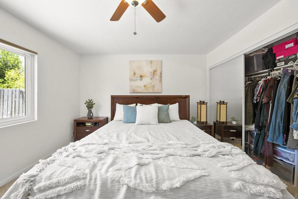 809 Buchanan Street Escondido, CA 92027 - Photo 18 of 32 a large white bed in a white room