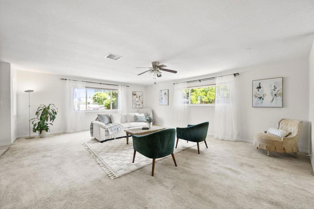 809 Buchanan Street Escondido, CA 92027 - Photo 2 of 32 a living room with furniture and a wooden floor