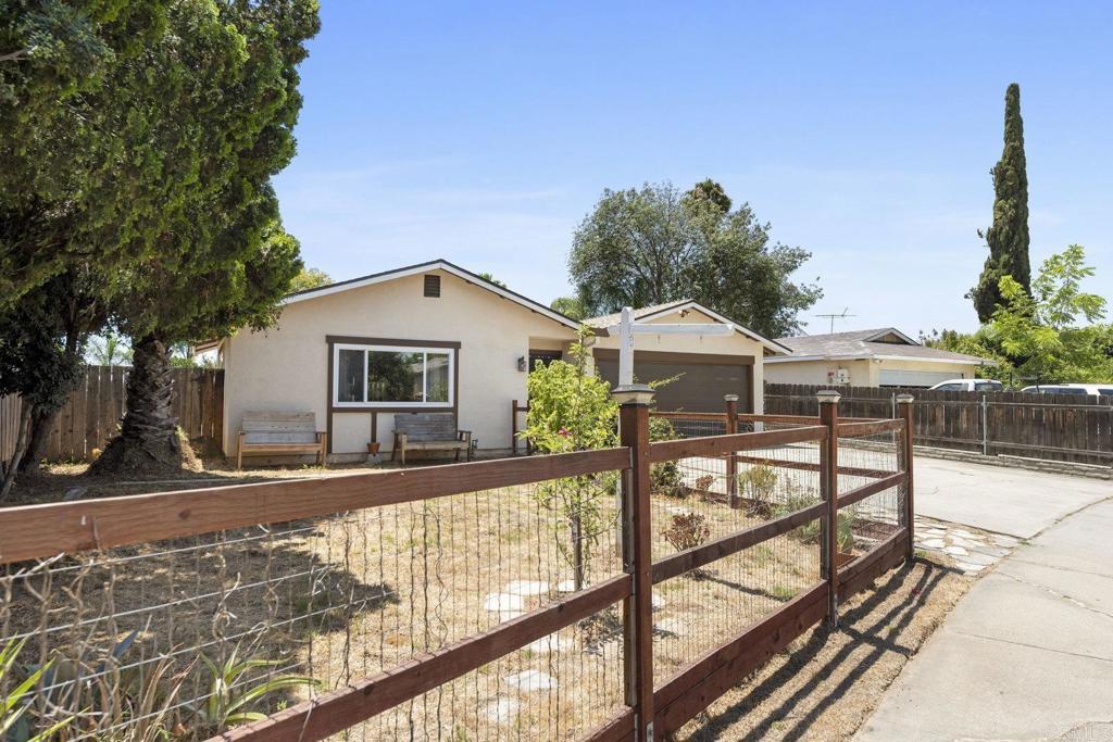 809 Buchanan Street Escondido, CA 92027 - Photo 30 of 32 a view of a house with backyard and sitting area