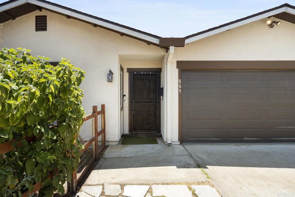 809 Buchanan Street Escondido, CA 92027 - Photo 32 of 32 a front view of a house with a garage