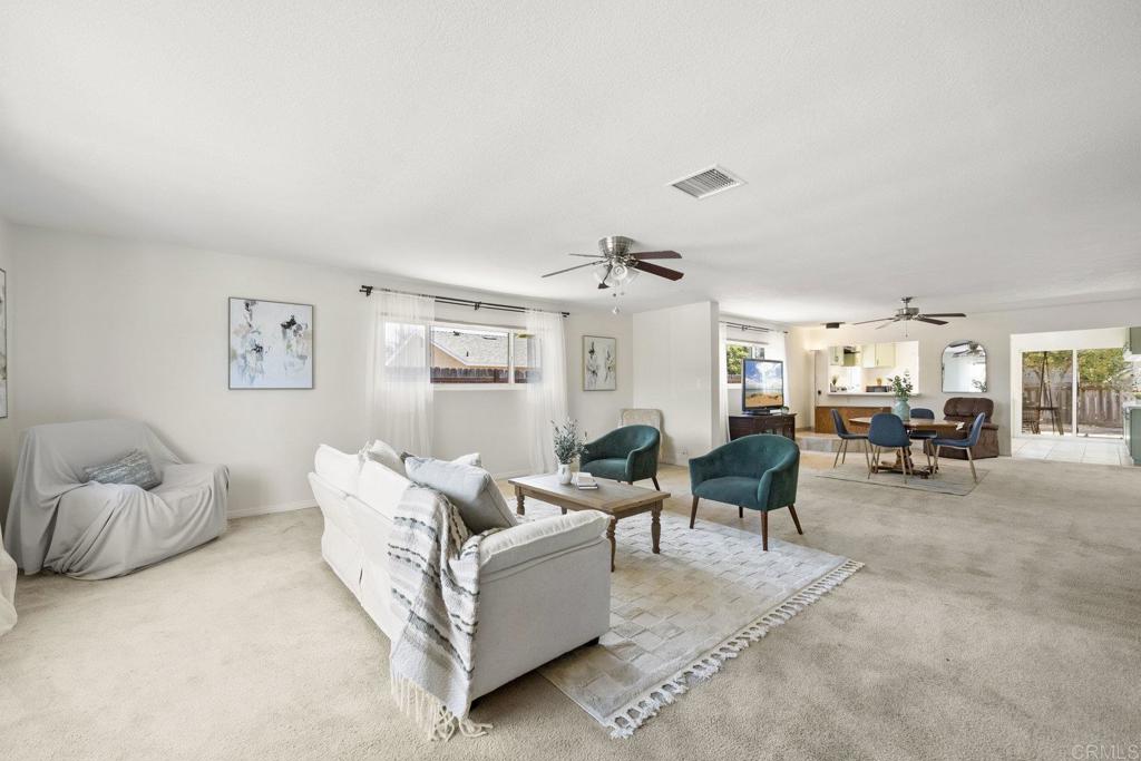 809 Buchanan Street Escondido, CA 92027 - Photo 5 of 32 a living room with furniture and a large window