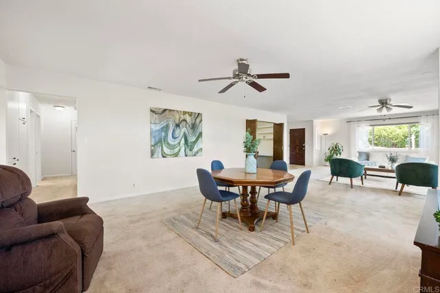 a view of a livingroom with furniture and window