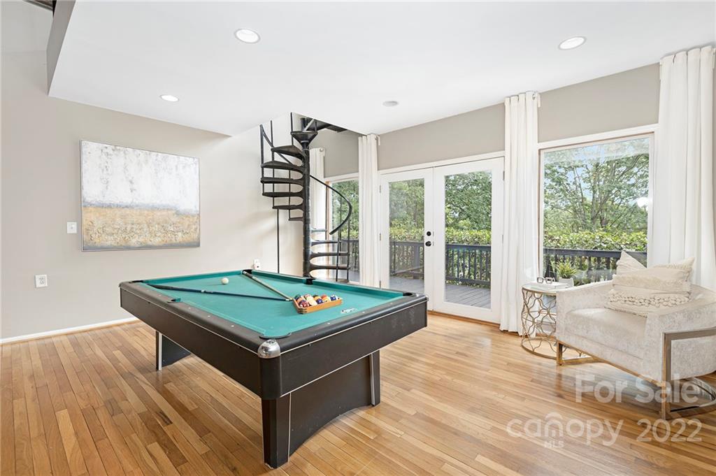 2011 Marquesas Avenue Tega Cay, SC 29708 - Photo 8 of 21 a room with pool table and windows