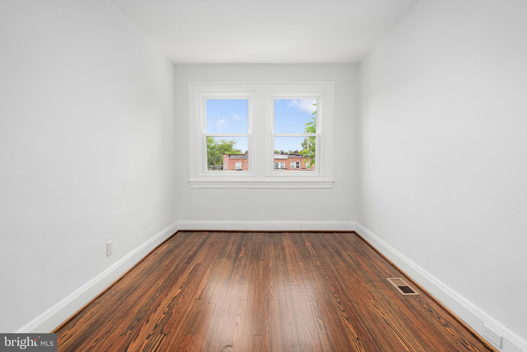 83 Willow Spring Road Dundalk, MD 21222 - Photo 25 of 36 wooden floor in an empty room with a window