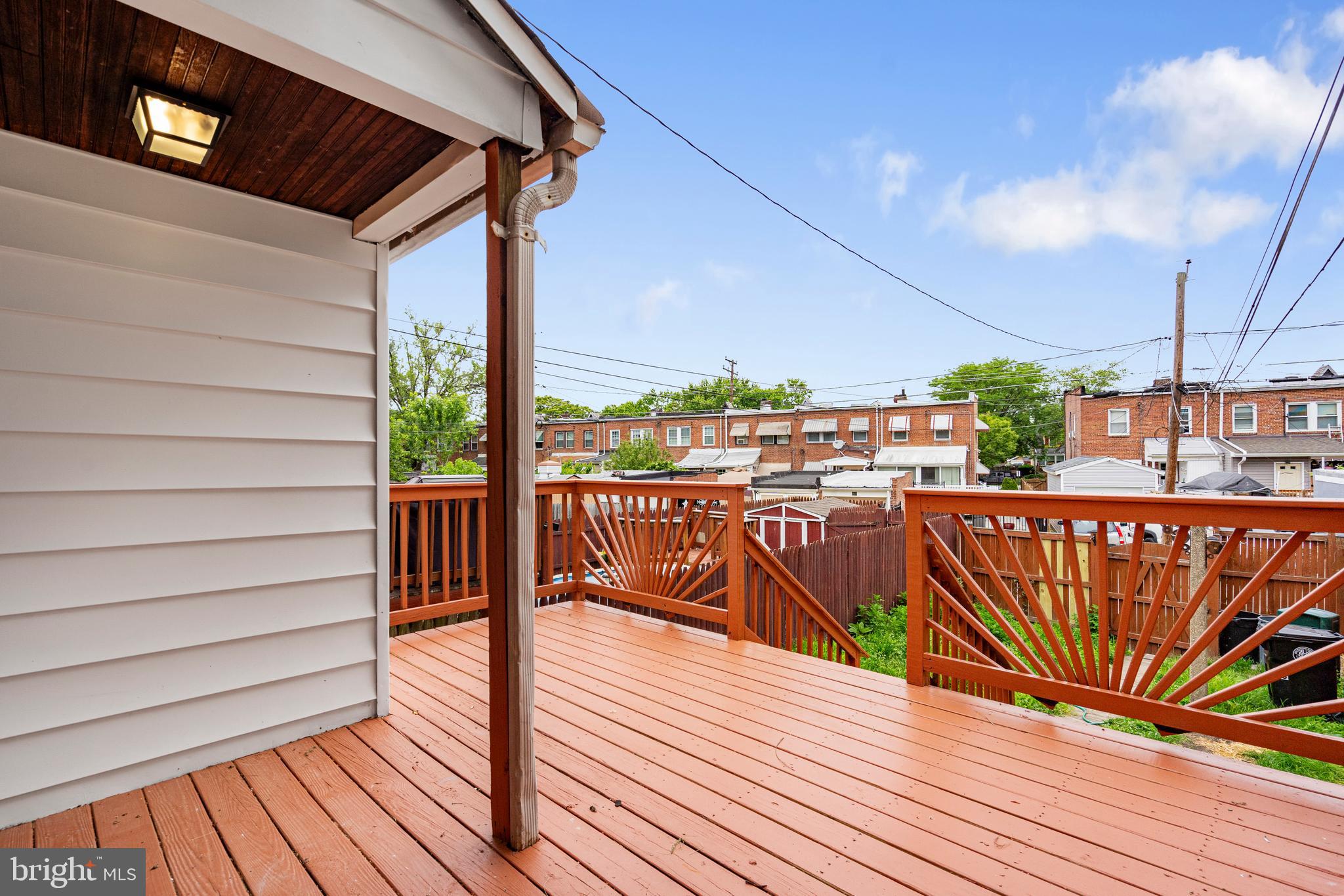 83 Willow Spring Road Dundalk, MD 21222 - Photo 34 of 36 a view of a balcony with wooden floor