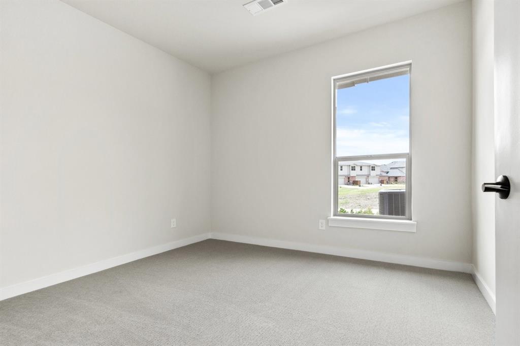 8509 Del Rio Trail Wylie, TX 75098 - Photo 18 of 26 022-8509DelRioTrail-Rowlett-TX-75089-Bedroom2.jpg-SMALL