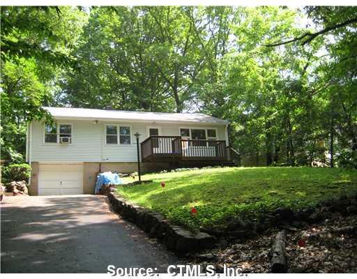 346 West Woods Road Hamden, CT 06514 - Photo 1 of 1 a front view of a house with a yard