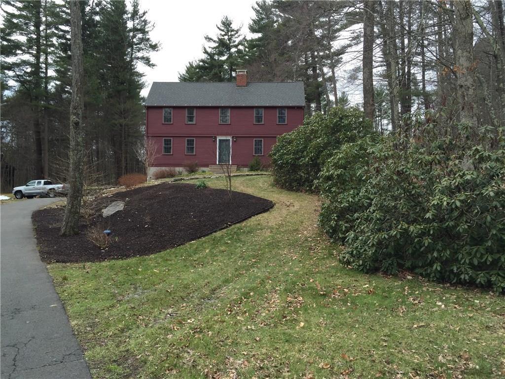 54 Hanson Road Canton, CT 06019 - Photo 1 of 1 a view of a big yard with plants and large trees