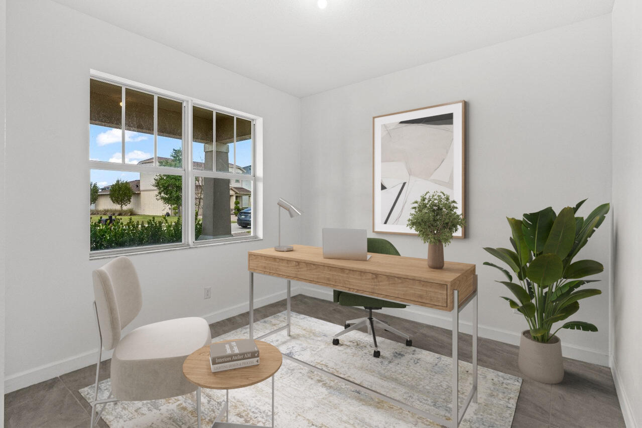 19659 Rugged Trunk Trail Loxahatchee, FL 33470 - Photo 20 of 61 a view of a dining room with furniture window and wooden floor