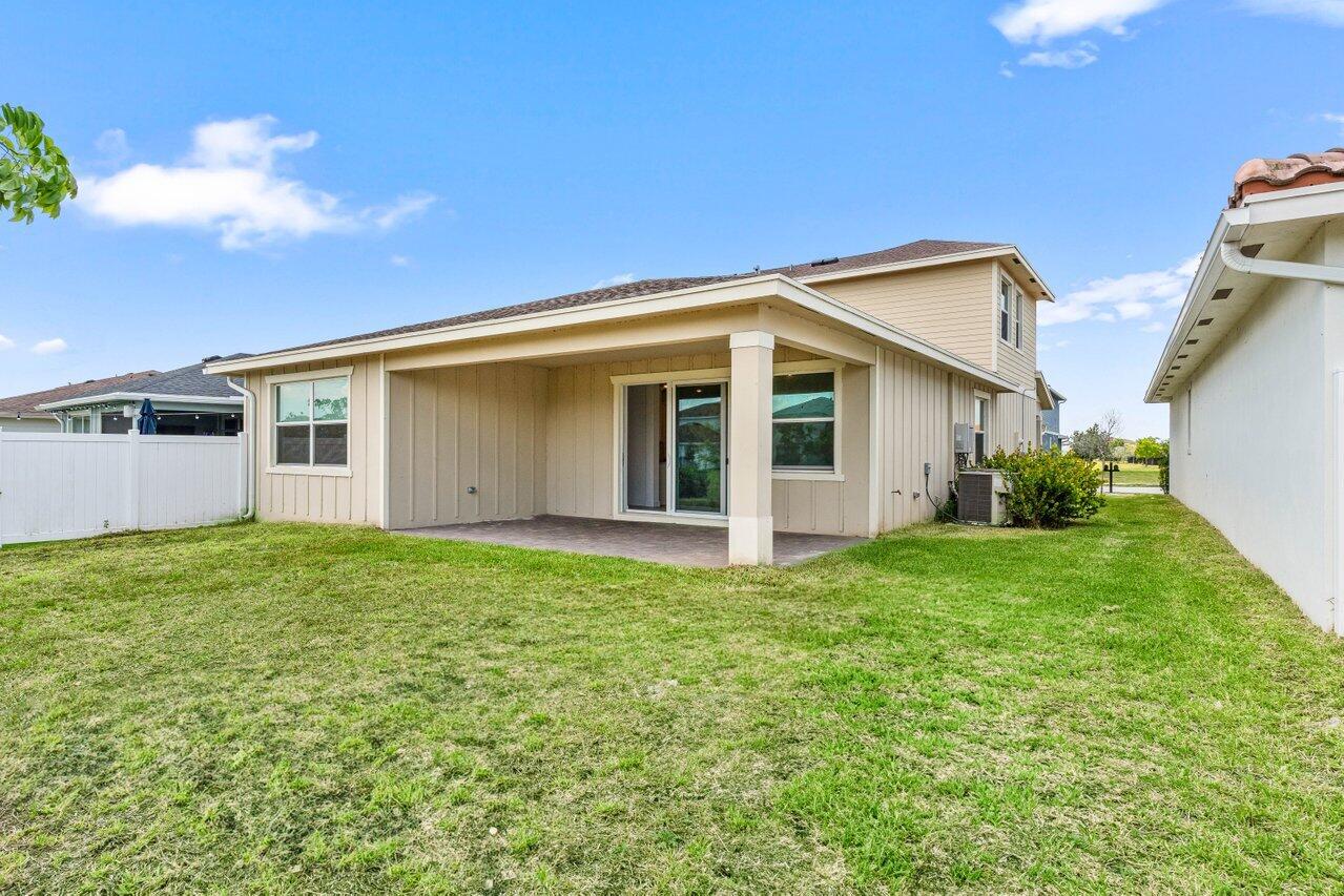 19659 Rugged Trunk Trail Loxahatchee, FL 33470 - Photo 35 of 61 a view of a house with backyard