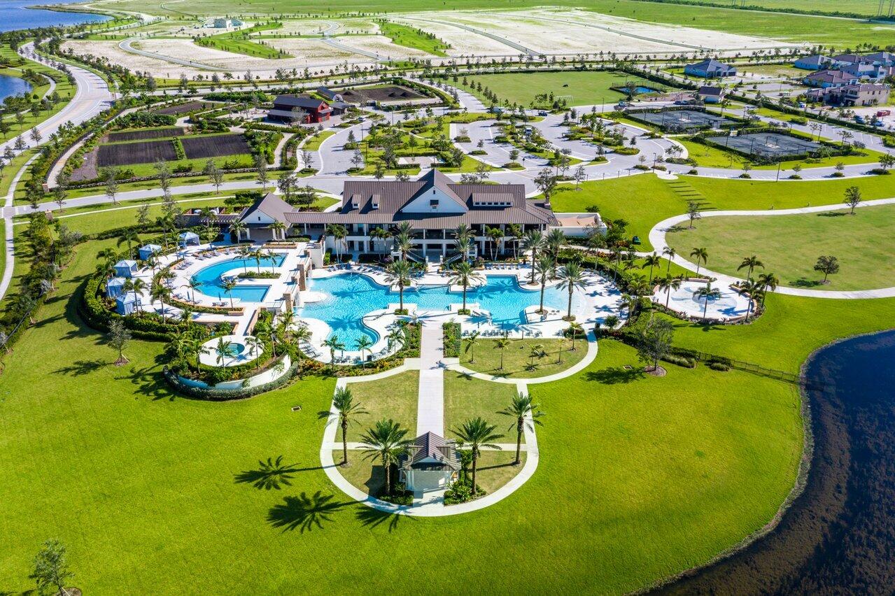 19659 Rugged Trunk Trail Loxahatchee, FL 33470 - Photo 39 of 61 a view of a swimming pool with outdoor seating and yard