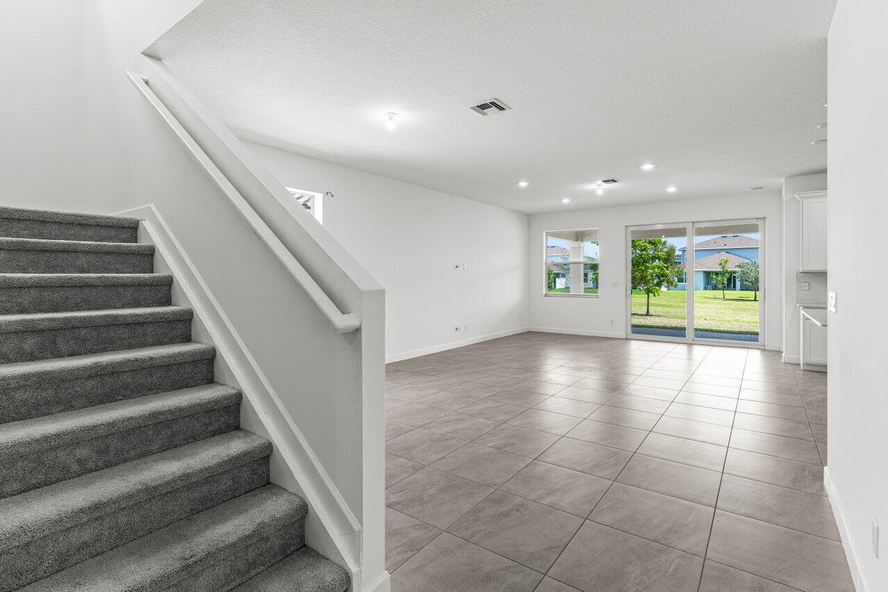 19659 Rugged Trunk Trail Loxahatchee, FL 33470 - Photo 5 of 61 a view of an entryway with wooden floor