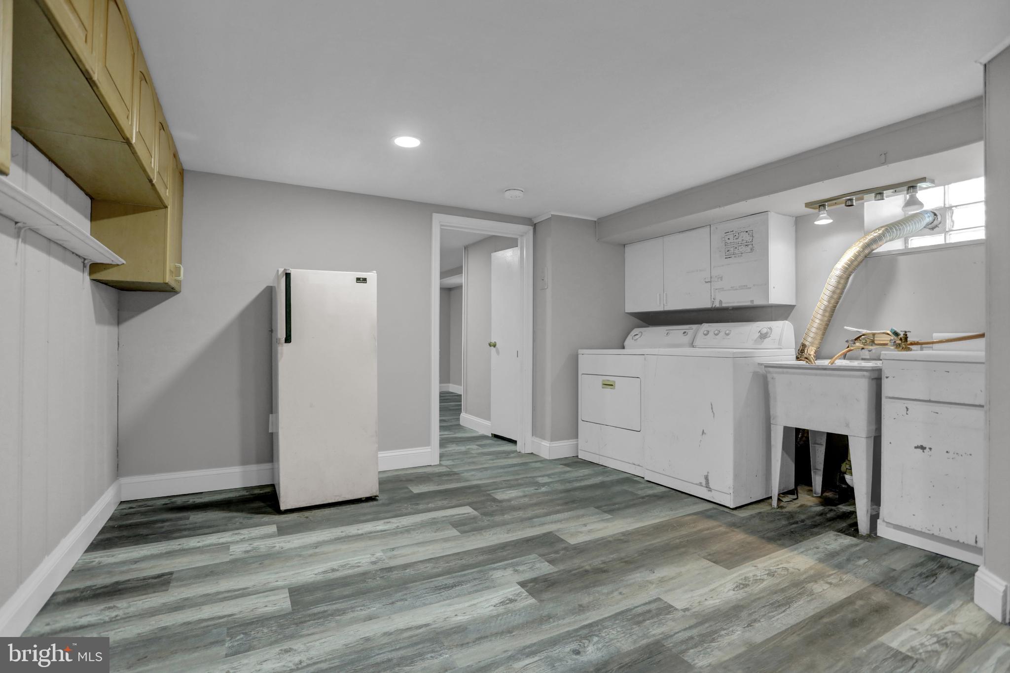 6855 Dunbar Road Dundalk, MD 21222 - Photo 21 of 28 Basement den/laundry