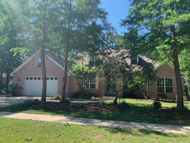 189 Red Maple Way Niceville, FL 32578 - Photo 1 of 58 a view of a house with a yard and a large tree