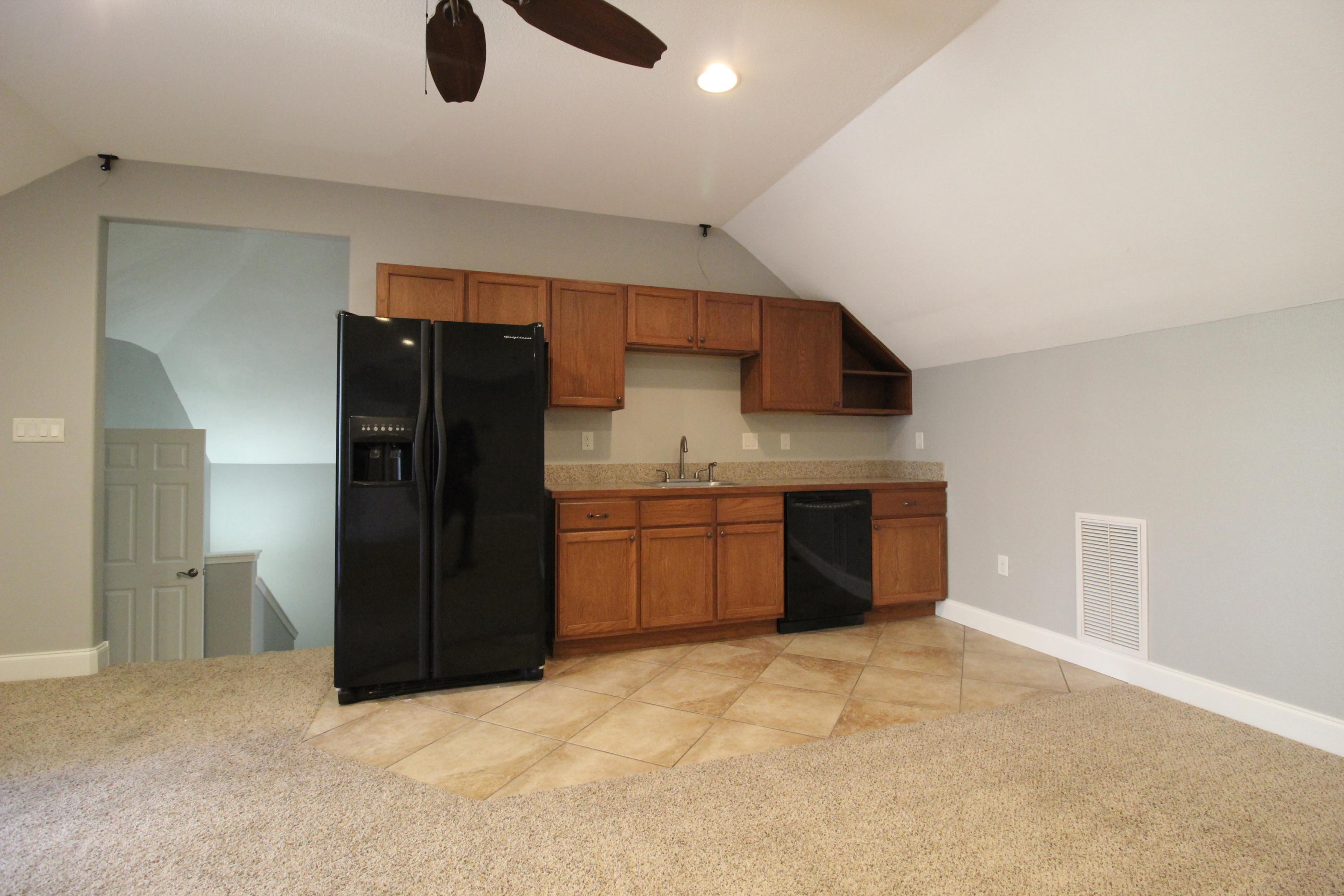 189 Red Maple Way Niceville, FL 32578 - Photo 38 of 58 a kitchen with stainless steel appliances kitchen island granite countertop a refrigerator and a sink