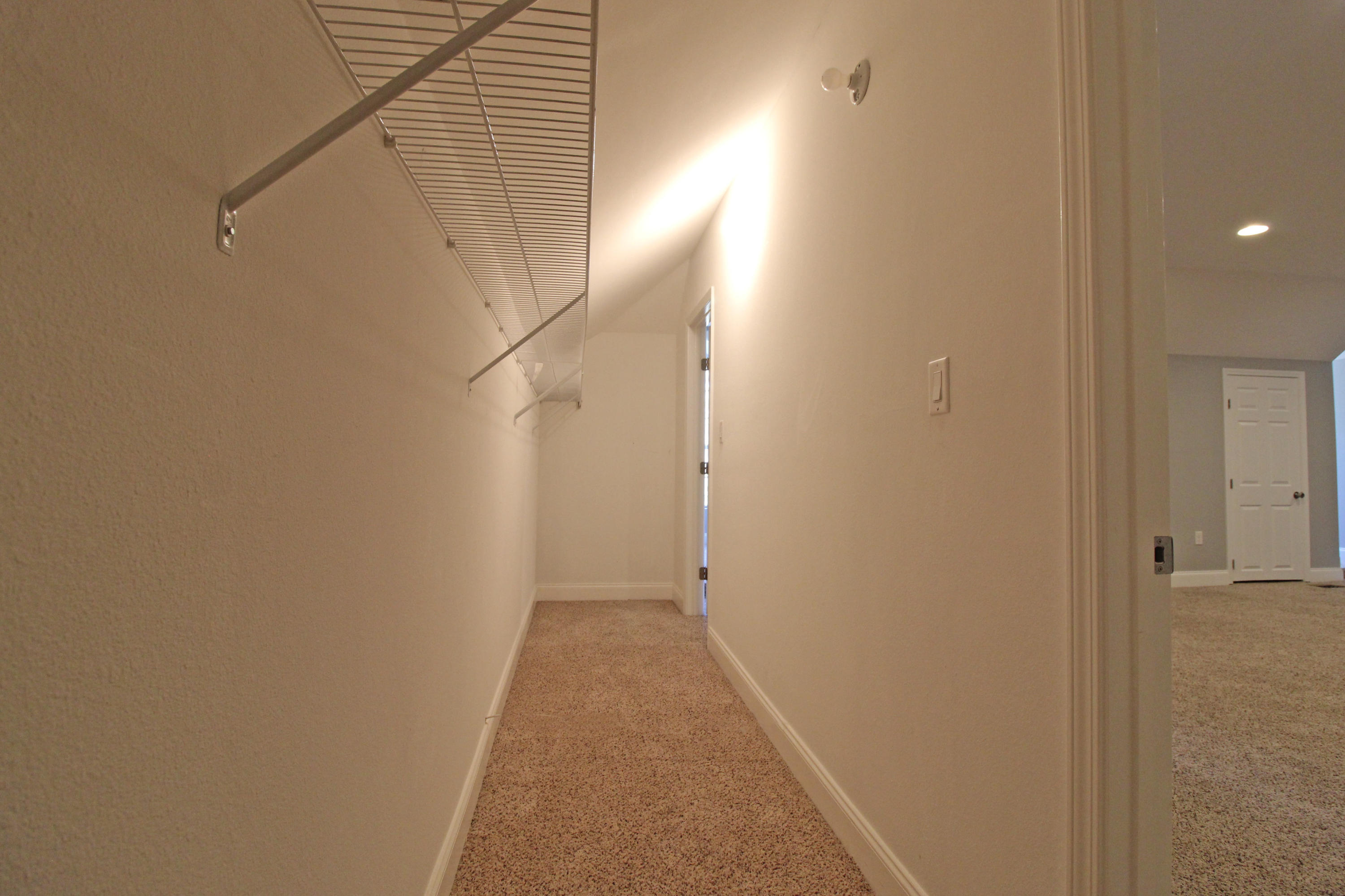 189 Red Maple Way Niceville, FL 32578 - Photo 43 of 58 a view of hallway with stairs