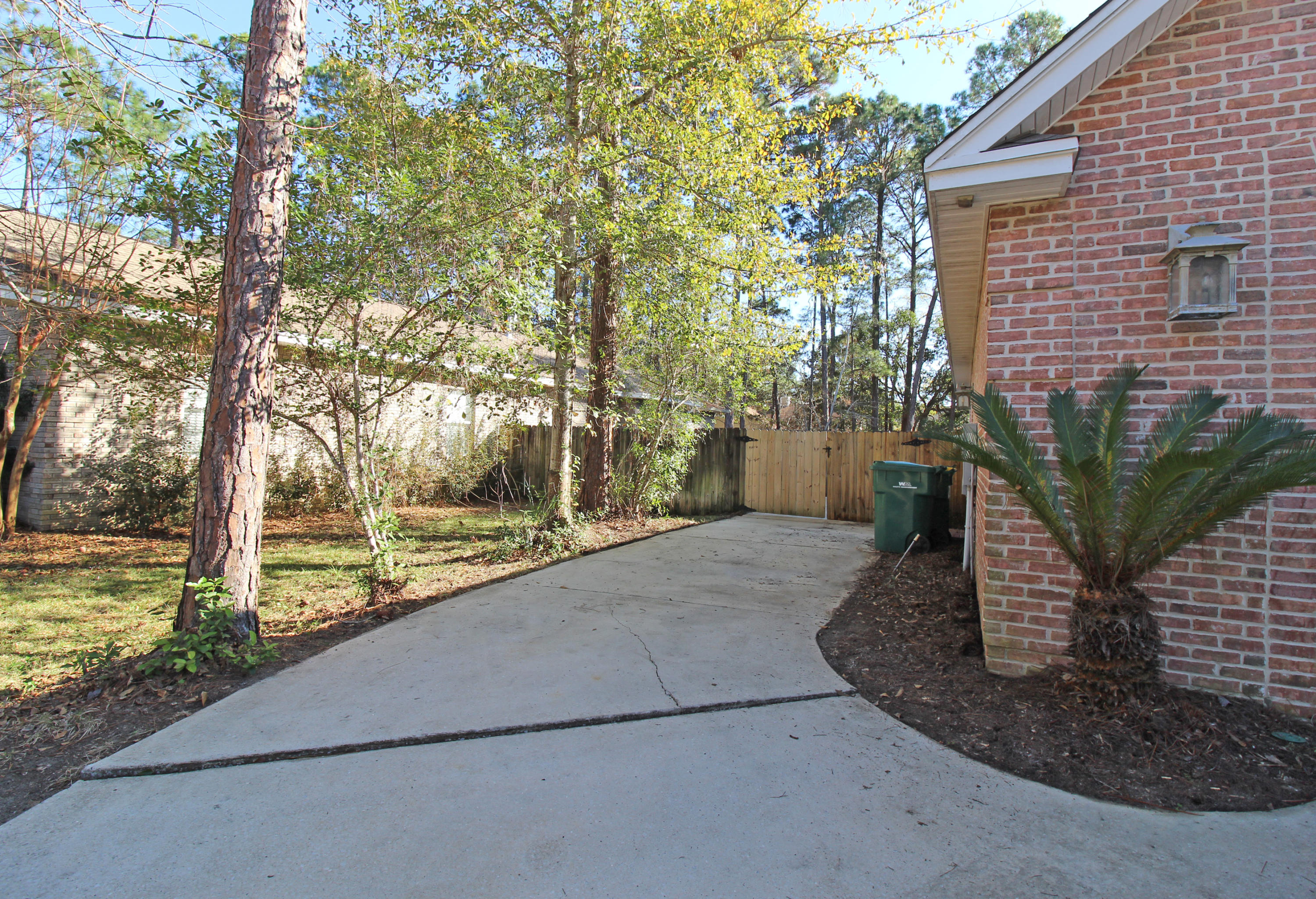 189 Red Maple Way Niceville, FL 32578 - Photo 56 of 58 a view of a house with a yard and potted plants
