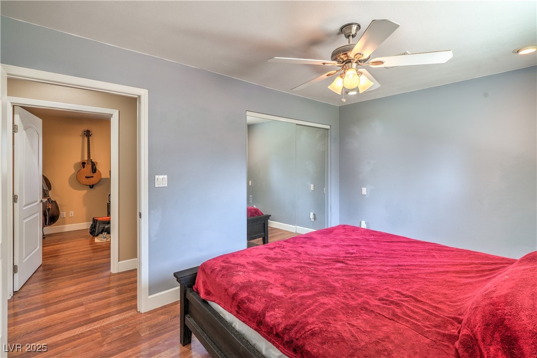 1201 I Boulder City, NV 89005 - Photo 16 of 26 Bedroom with wood finished floors and a ceiling fan