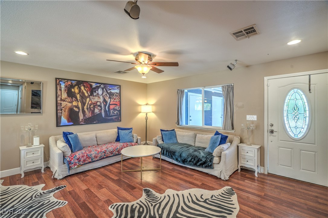 1201 I Boulder City, NV 89005 - Photo 5 of 26 Living area with wood finished floors, a ceiling fan, and recessed lighting