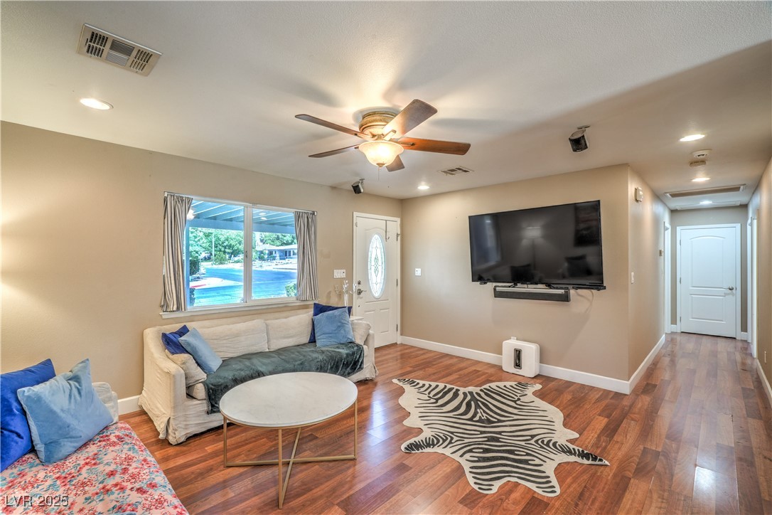 1201 I Boulder City, NV 89005 - Photo 6 of 26 Living area with wood finished floors, ceiling fan, and recessed lighting