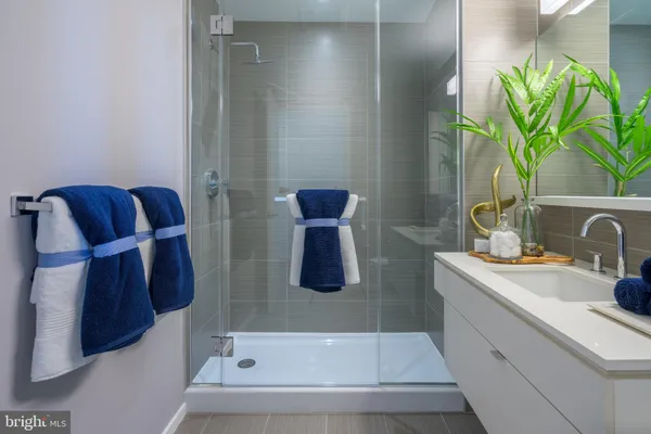 a bathroom with a tub sink and toilet