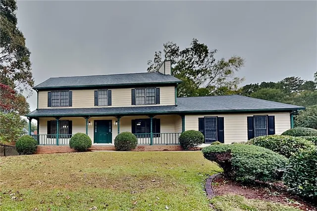 front view of a house with a yard