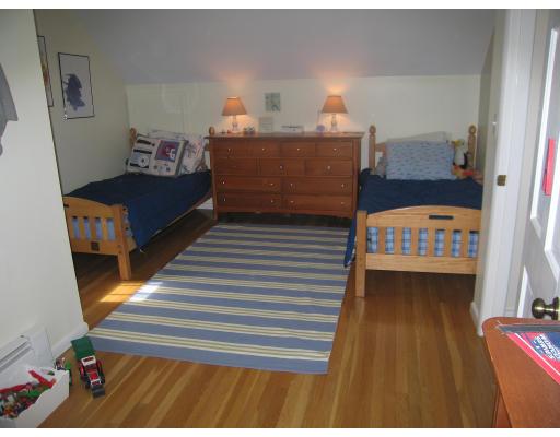 106 Monsen Road Concord, MA 01742 - Photo 6 of 9 a living room with furniture and a wooden floor