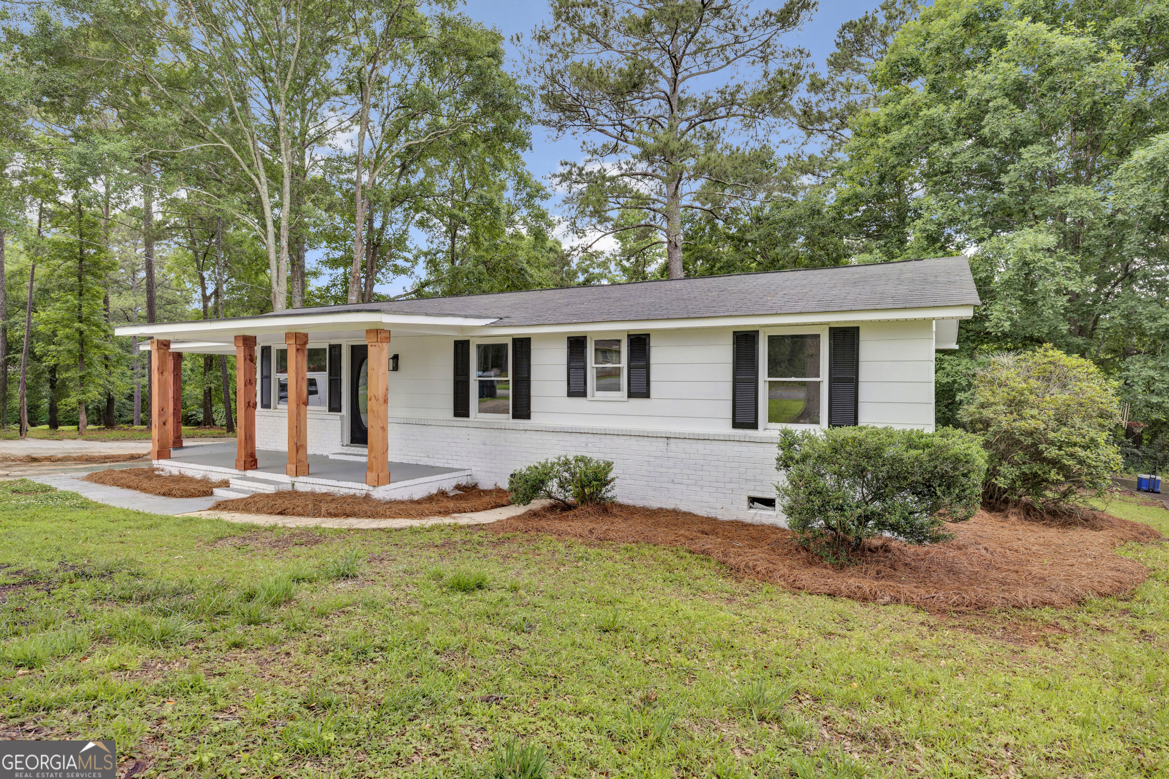 455 Cindy Street Jackson, GA 30233 - Photo 23 of 25 front view of a house with a yard