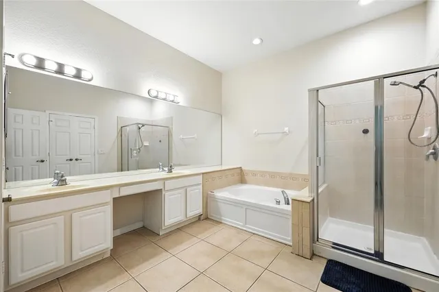 a white toilet sitting next to a white wall