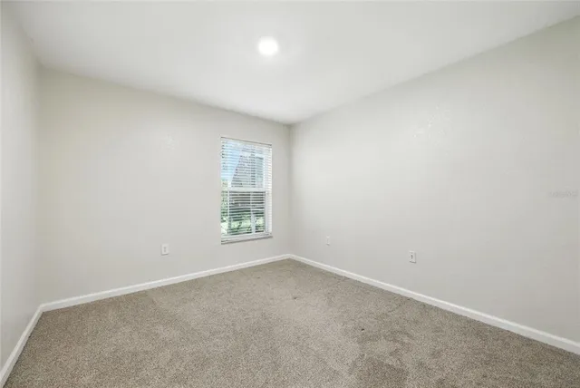 a bathroom with a sink toilet and vanity