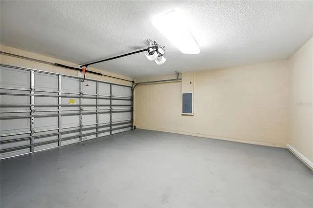 a view of a patio with table and chairs