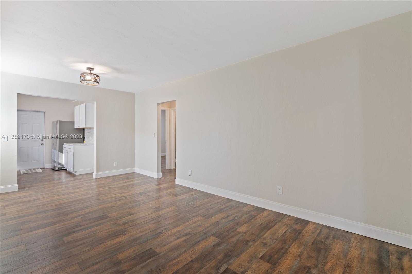 5571 Southwest 5th Terrace Miami, FL 33134 - Photo 11 of 37 a view of empty room with wooden floor